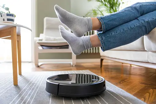 Image showing Shark Robot vacuum cleaning the floors