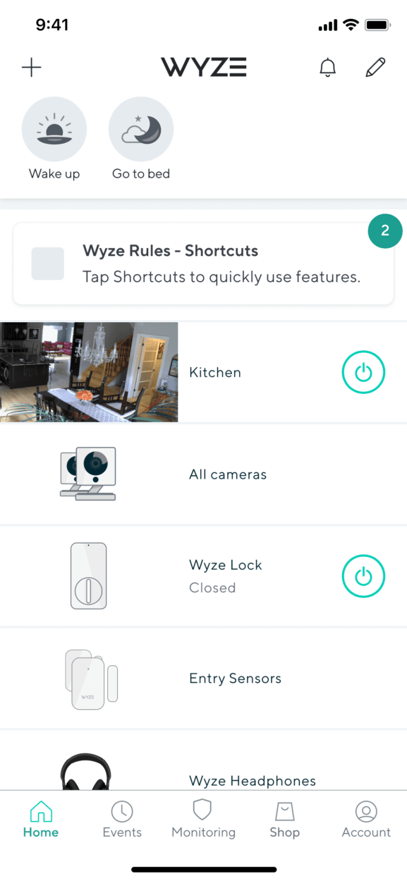 An image showing Wyze camera working and a footage screenshot of a kitchen is shown