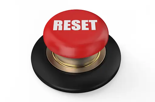 Image showing a red button with "RESET" written on it